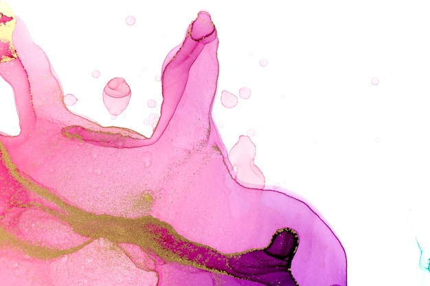 Abstract watercolor pink and violet gradient background with gold ink drops