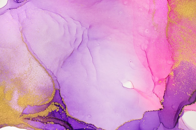 Abstract watercolor pink and violet gradient texture with gold glitter