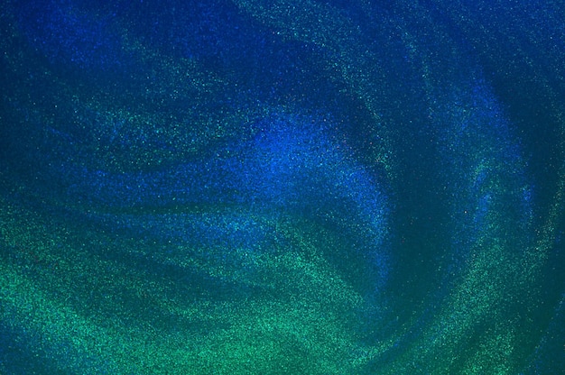 Abstract wavy overflows of liquid with glitter