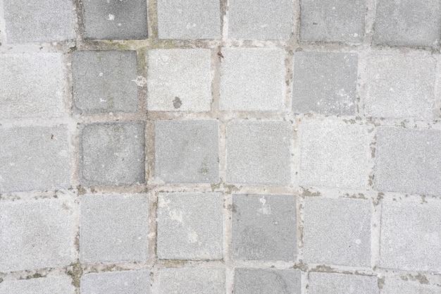 Abstract weathered textured white brick wall background