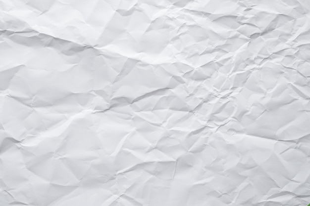 Abstract white crumpled paper texture background