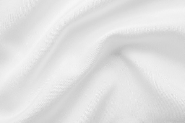 Абстрактная белая ткань с мягкой волной текстуры фона