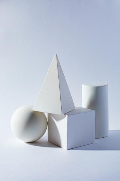 Abstract white geometrical figures still life on the white