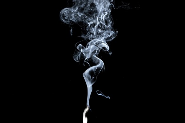 Abstract, white smoke isolated on black