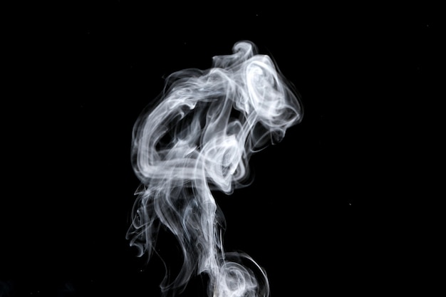 Abstract, white smoke isolated on black 