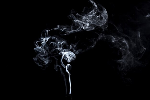 Abstract, white smoke isolated on black