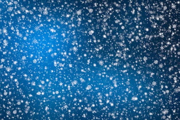 Abstract winter background with snowflakes. Snow blue background