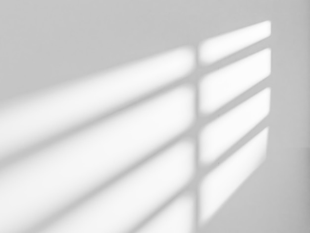 Foto abstract witte studio achtergrond voor productpresentatie muur met schaduwen van venster display product