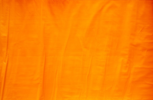 Abstract wrinkles orange paper texture background