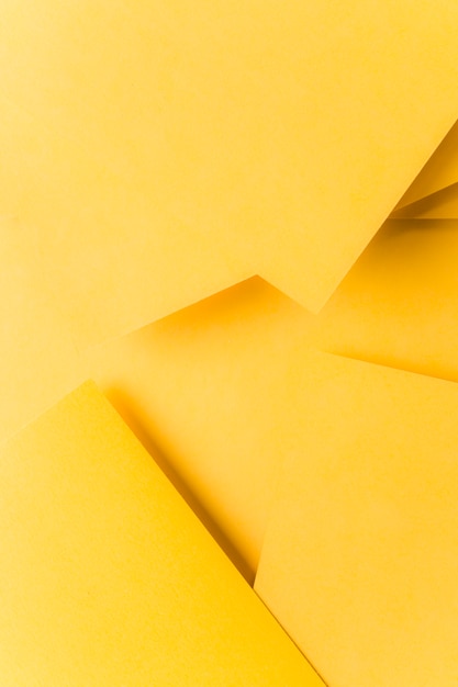 Photo abstract yellow origami background