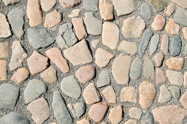 Abstracte achtergrond van geplaveide asfaltsteen Steen asfaltstructuur