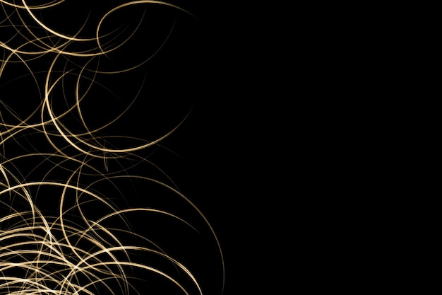 Foto abstracte afbeelding van gouden lichtsporen op een zwarte achtergrond met kopieerruimte