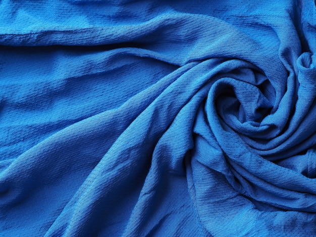 Abstracte blauwe van de stoffendoek textuur als achtergrond.