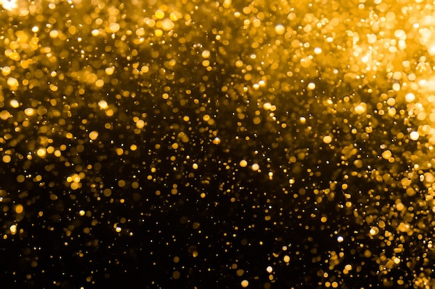 Abstracte gouden bokeh met zwart