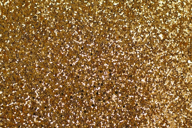 Abstracte gouden luxe feestelijke glamour glitter textuur achtergrond schittert