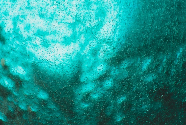 Foto abstracte groene achtergrond. water glitter turquoise textuur. creatief ontwerp