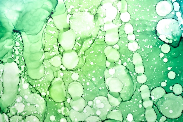 Abstracte groene verfachtergrond. Water bubbels druppels vlekken spatten structuurpatroon