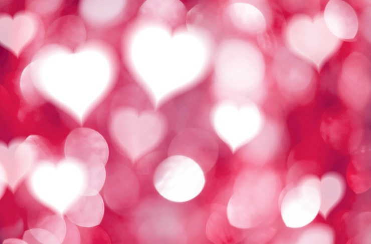 Foto abstracte harten en rode bokeh lichte achtergrond voor valentijnskaartendag