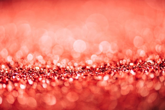 abstracte kerstachtergrond met rode glitter en bokeh