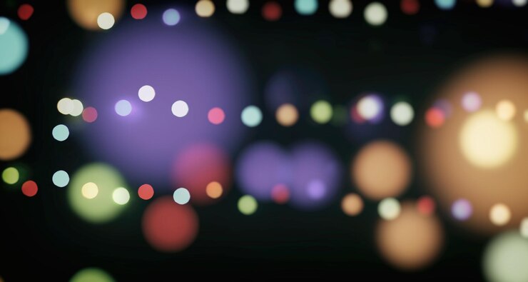Foto abstracte lichte vieringsachtergrond met intreepupil gouden lichten voor kerstmis, nieuwjaar, vakantie, party