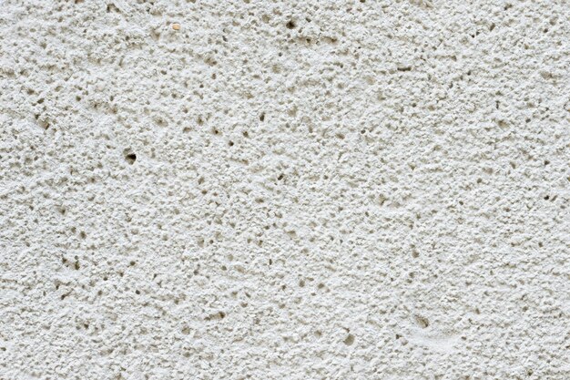 Foto abstracte oppervlakte en texturen van witte betonnen stenen muur
