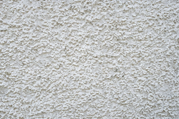 Foto abstracte oppervlakte en texturen van witte betonnen stenen muur