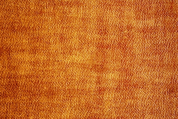 Abstracte oranje lederen achtergrond of textuur