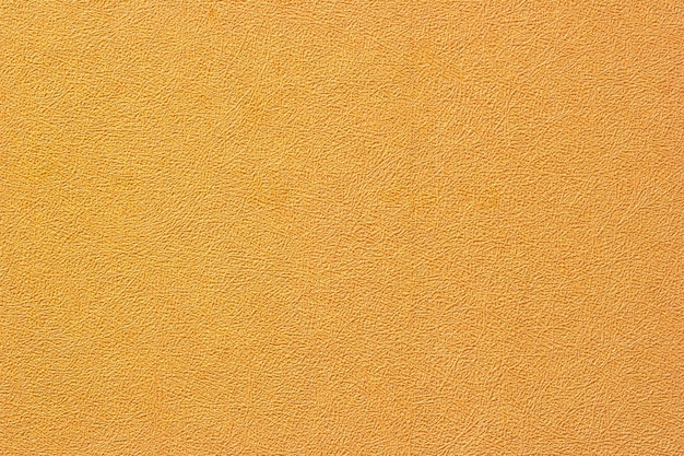 Abstracte oranje ruwe achtergrond en textuur