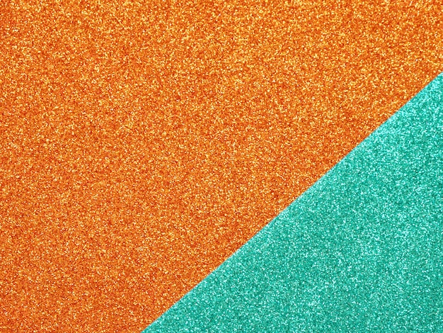 Abstracte oranje-turquoise glter achtergrond.