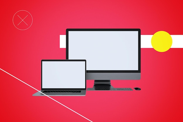 Abstracte pc en laptop op rode achtergrond
