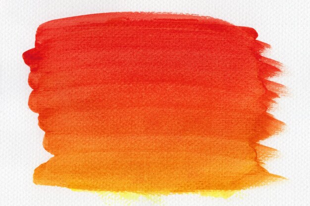 Abstracte rode en oranje aquarel op witte achtergrond De kleur spatten op het papier Het is een handgetekende