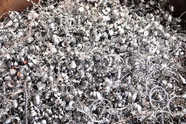 Abstracte texturen en patronen Schrootkrullen wervelingen Recycling van staalschrootmaterialen