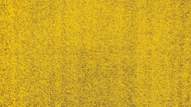 Abstracte textuur van gele grasoppervlak voor achtergrondontwerp opvultekst
