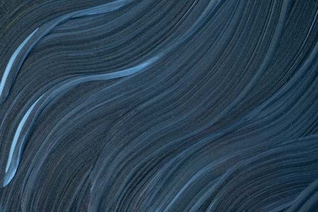 Abstracte vloeibare kunst marineblauwe kleuren als achtergrond. Vloeibaar marmer. Acryl schilderij op canvas met donkergrijs verloop. Aquarel achtergrond met golvenpatroon.