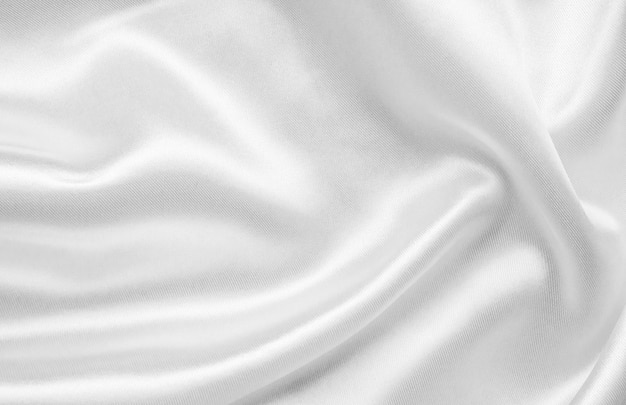 Abstracte witte stof met een zachte golftextuur op de achtergrond