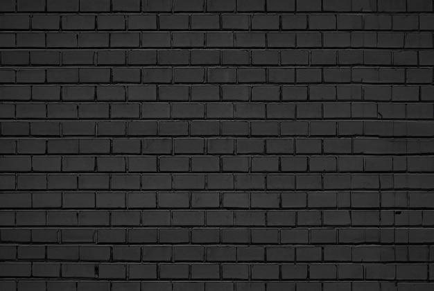 Abstracte zwarte bakstenen muurpatroon achtergrond en zwarte achtergrond Blank copy space