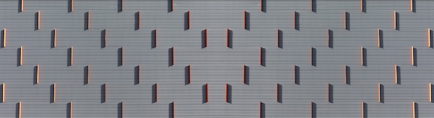 Abstraction orange vertical stripes on a gray embossed background