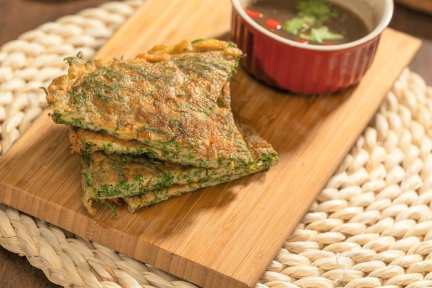 Photo acacia pennata omelette with shrimp-paste