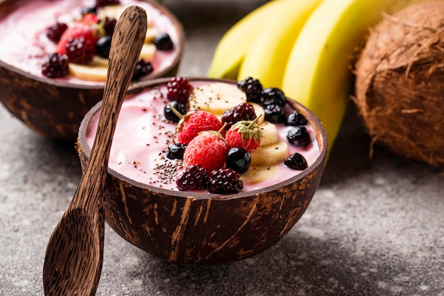 Acai bowl in coconut plate. 