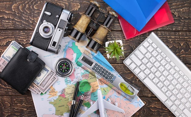 Photo accessories and items for traveling on the table in composition