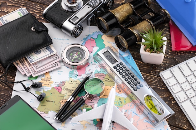 Photo accessories and items for traveling on the table in composition