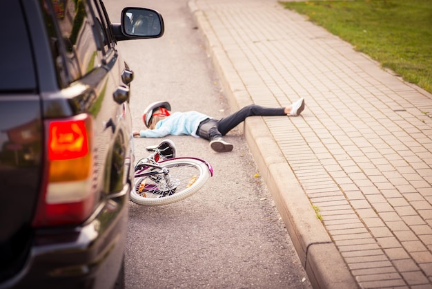 Accident Girl on the bicycle is hit by the car