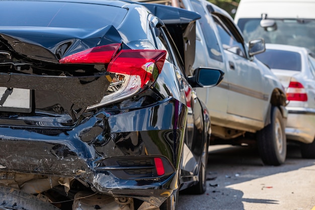 Premium Photo  Many broken cars after a traffic accident in the parking  lot of a restoration service station on the street car body damage workshop  outdoors sale of insurance emergency vehicles