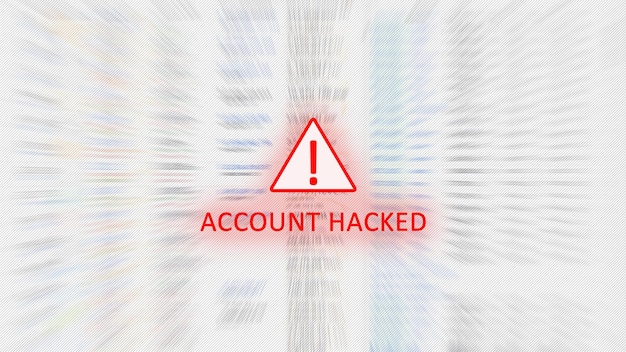 Account hacked concept with a red exclamation mark in the\
warning triangle. loss of access. the background is blurred in\
motion.