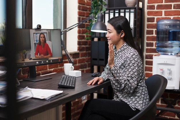 Accountant on remote internet videocall conference with superior talking about failed startup. Business analyst briefing general manager regarding project status and marketing strategy.