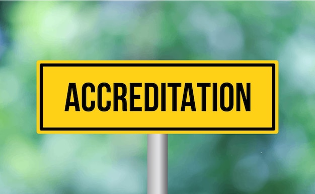 Accreditation road sign on blur background