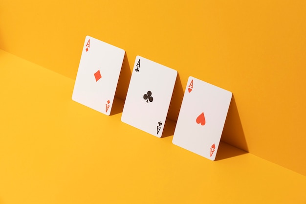 Ace cards on yellow background