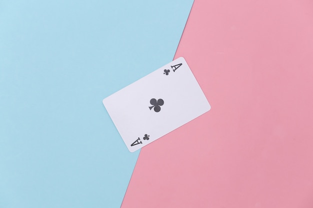 Photo ace of clubs on pink blue background.