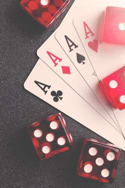 Ace playing cards with red dice Casino betting and gambling concept