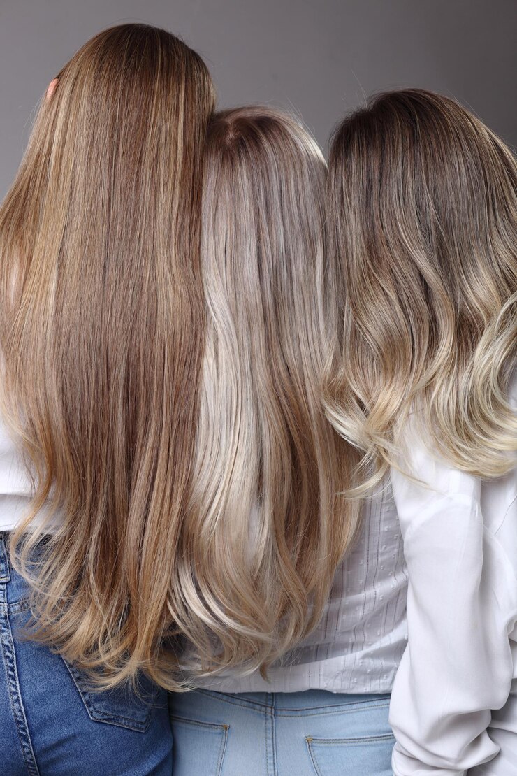 Achteraanzicht portret van trio met verschillende haarkleur